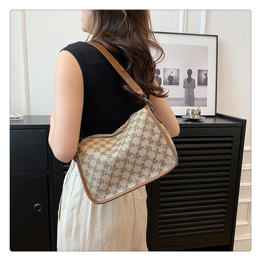 Fasjonabel og trendy crossbody-veske