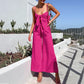 Trendy jumpsuit uten ermer med vidde i bena og slips foran