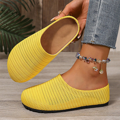 Pustende strikkede slip-on mules for kvinner